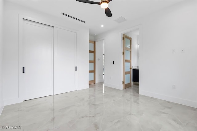 unfurnished bedroom featuring a closet and ceiling fan