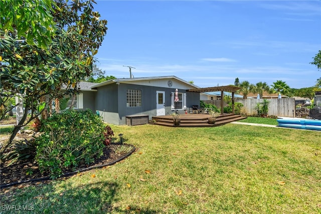 view of yard with a deck