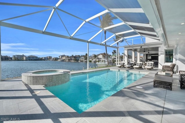 view of pool with a lanai, an outdoor hangout area, a water view, an in ground hot tub, and a patio