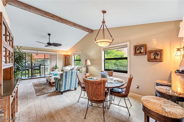 dining area featuring lofted ceiling with beams, light hardwood / wood-style floors, and ceiling fan