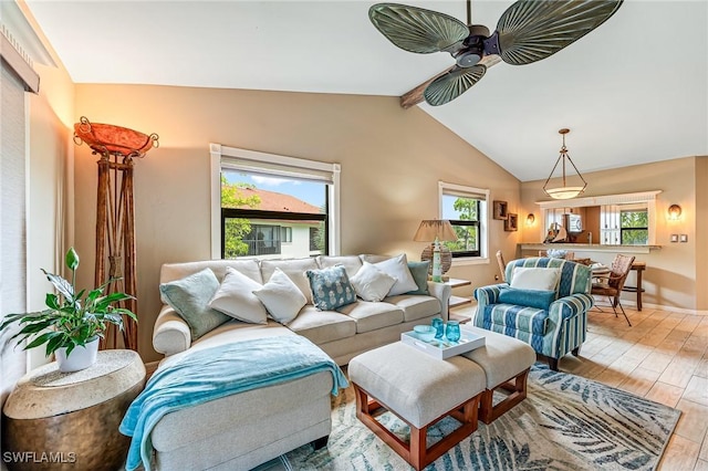 living area featuring ceiling fan and light wood-style flooring