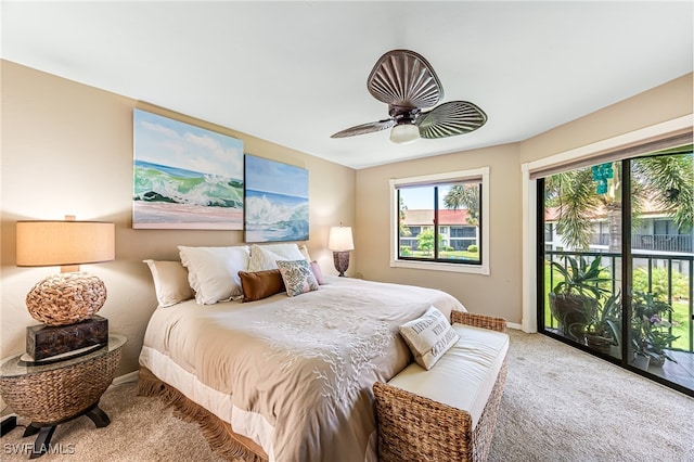 carpeted bedroom featuring access to outside and ceiling fan