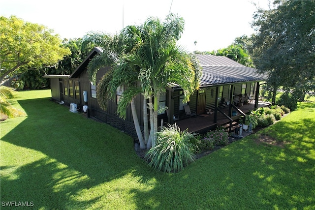 view of property exterior featuring a yard