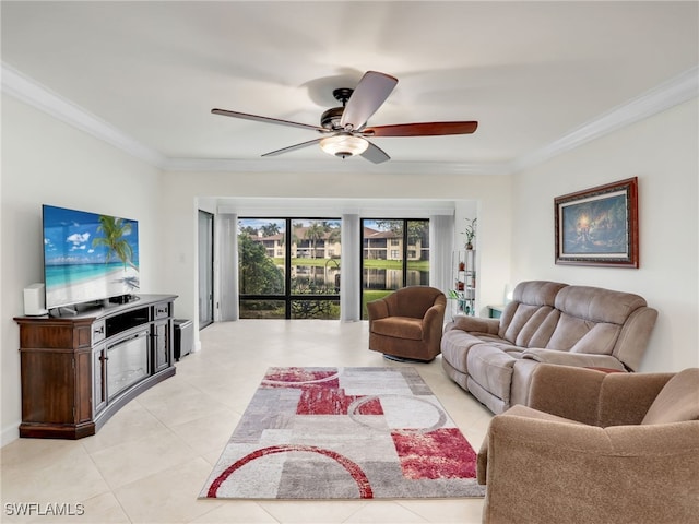 living area featuring crown molding, light tile patterned floors, and a ceiling fan