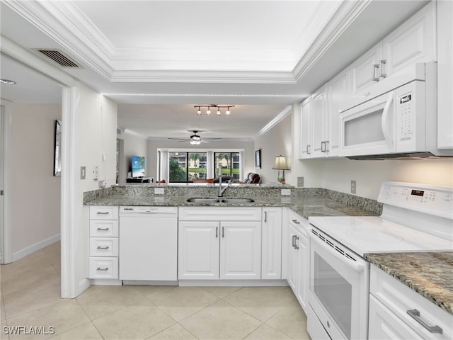 kitchen featuring visible vents, ornamental molding, white appliances, white cabinetry, and a sink