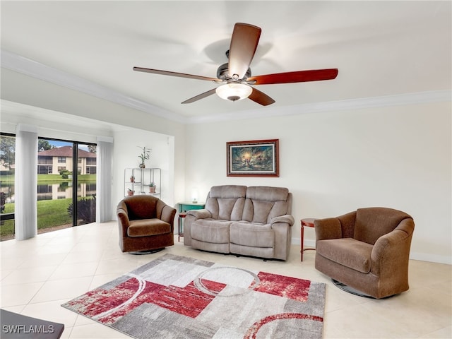 living area featuring crown molding, tile patterned floors, and ceiling fan