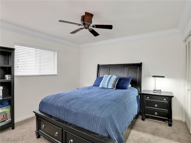 bedroom featuring baseboards, light carpet, and crown molding