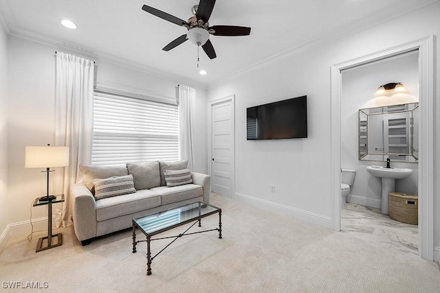 5154 Andros Dr, Naples, FL 34113 - living area with crown molding, baseboards, and ceiling fan