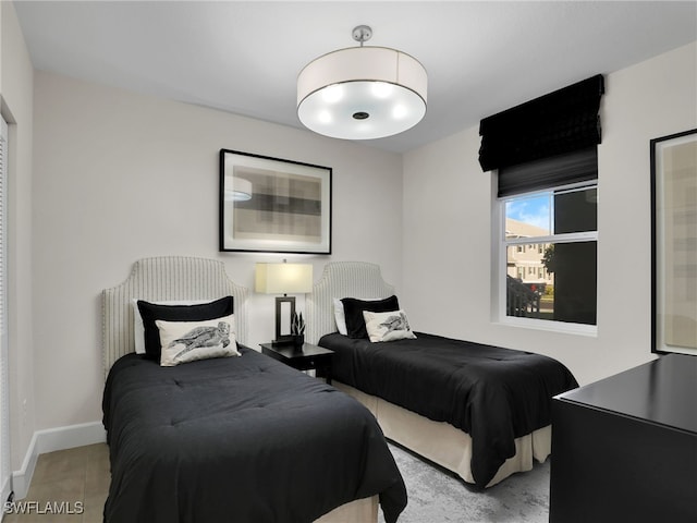 bedroom with light wood-type flooring