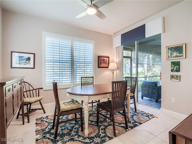 tiled dining room with ceiling fan