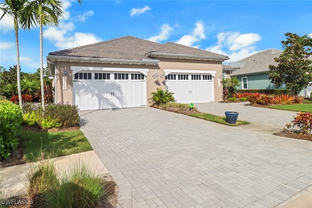 view of front of home with a garage