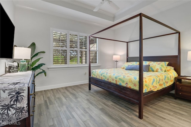 bedroom featuring light wood-type flooring and ceiling fan