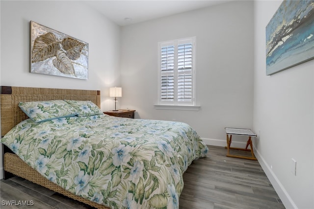 bedroom with wood-type flooring