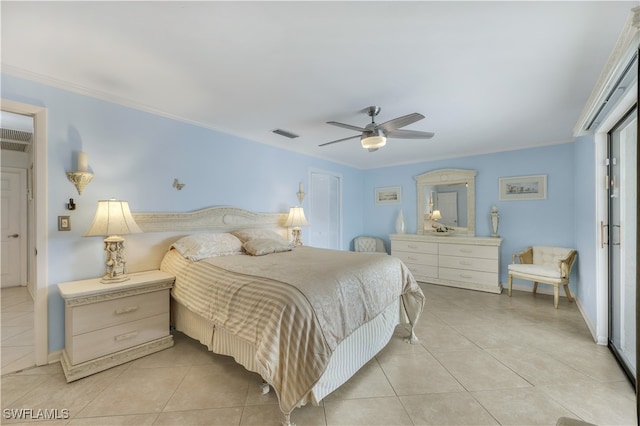 tiled bedroom with ceiling fan