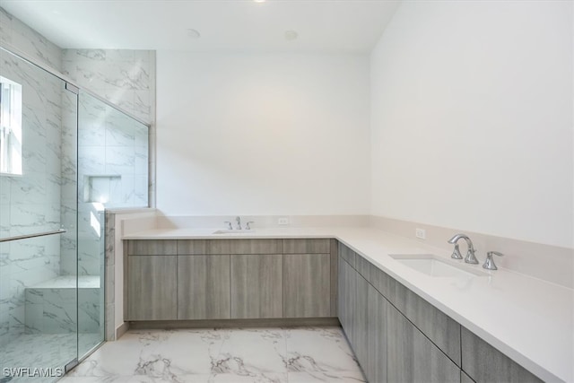 bathroom featuring vanity and a shower with shower door