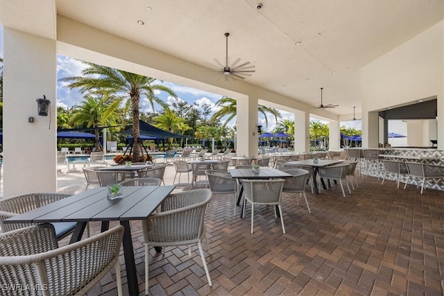 view of patio / terrace featuring ceiling fan