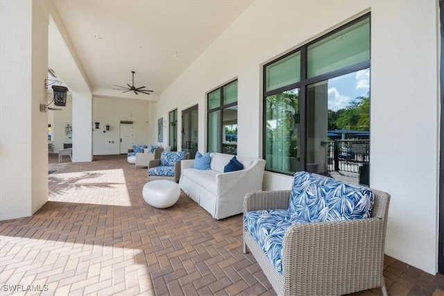 view of patio featuring ceiling fan