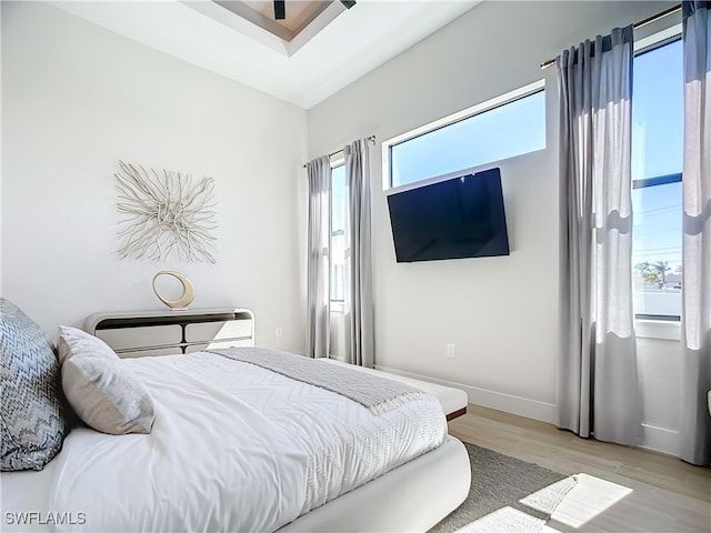 bedroom featuring light wood-type flooring