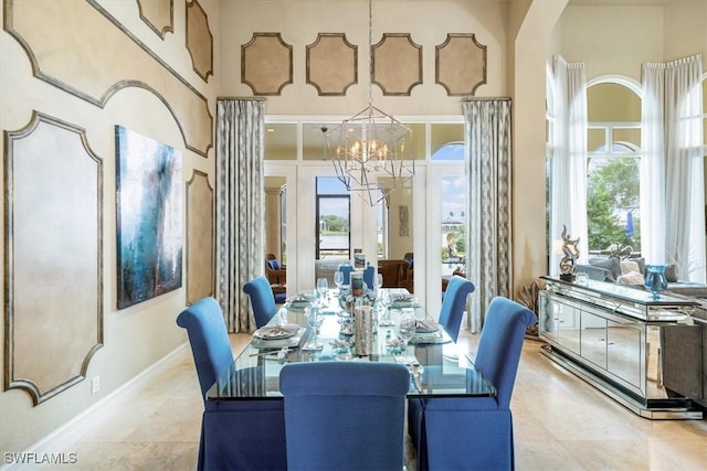 dining space with a chandelier