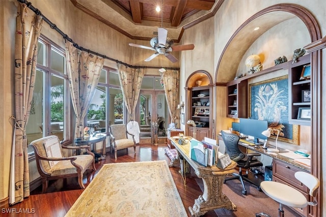 home office featuring a high ceiling, coffered ceiling, dark wood-type flooring, beamed ceiling, and ceiling fan