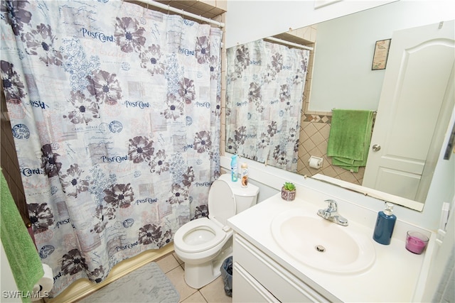 bathroom featuring tile walls, a shower with shower curtain, tile patterned floors, vanity, and toilet