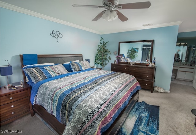 bedroom with light carpet, ensuite bath, ceiling fan, and crown molding