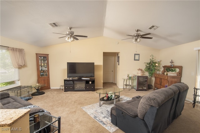 carpeted living room with lofted ceiling and ceiling fan