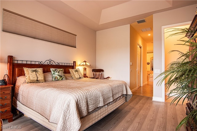 bedroom featuring hardwood / wood-style floors