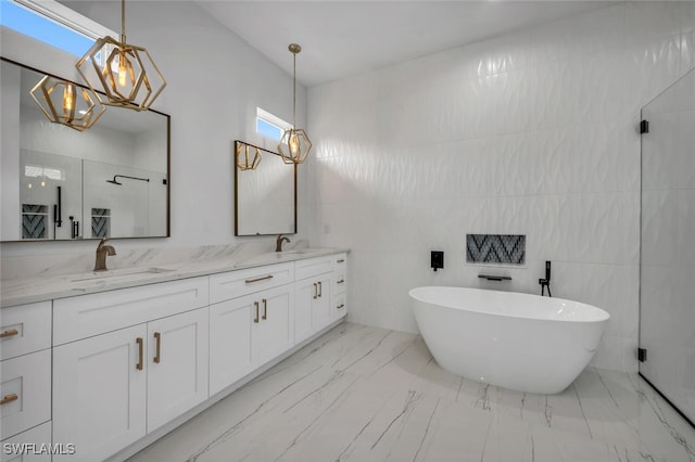 bathroom with shower with separate bathtub, vanity, and tile walls