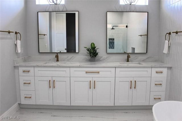 bathroom featuring vanity, a healthy amount of sunlight, and shower with separate bathtub