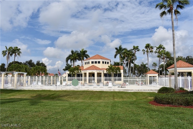 view of property's community featuring a lawn and a gazebo