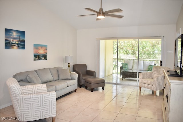 living room with vaulted ceiling, ceiling fan, and light tile patterned floors