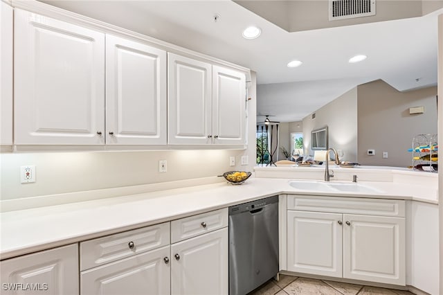 kitchen with dishwasher, white cabinetry, ceiling fan, and sink