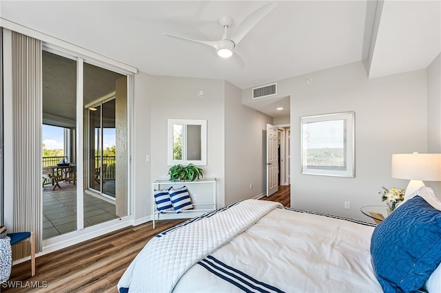 bedroom featuring access to outside, multiple windows, dark wood-type flooring, and ceiling fan