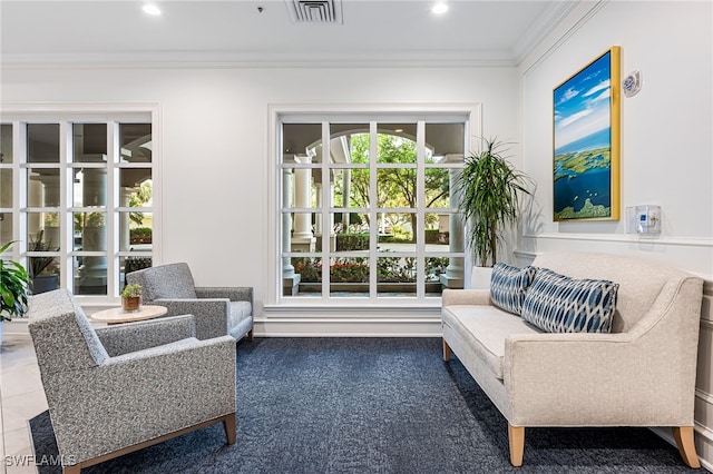 interior space with tile patterned floors and ornamental molding