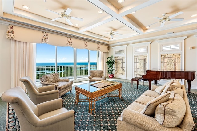 sunroom / solarium featuring ceiling fan, beam ceiling, a water view, and coffered ceiling