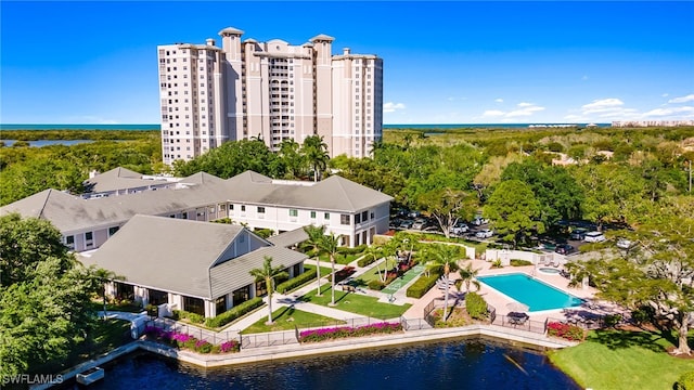 birds eye view of property featuring a water view