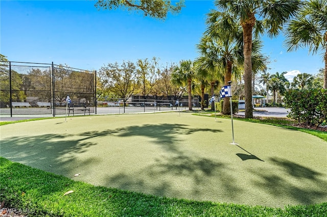 surrounding community with tennis court