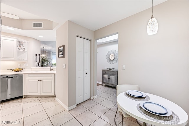 bathroom featuring tile patterned flooring and vanity