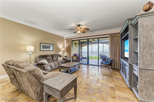 living room featuring ornamental molding and ceiling fan