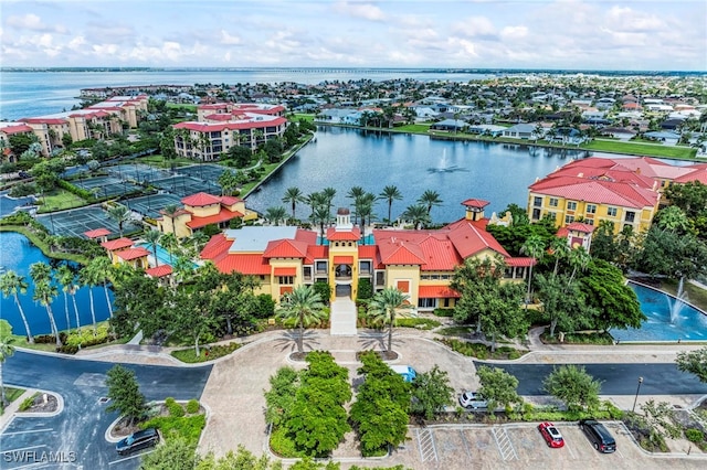 drone / aerial view with a water view