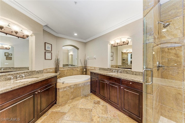 bathroom with plus walk in shower, vanity, and ornamental molding