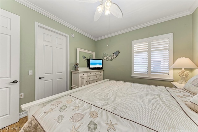 bedroom featuring ceiling fan and ornamental molding