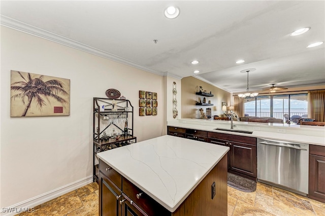 kitchen with ceiling fan, sink, a kitchen island, dark brown cabinets, and dishwasher