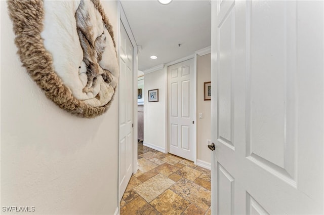 hallway with crown molding