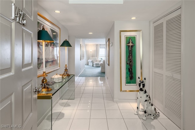 hallway featuring light tile patterned flooring