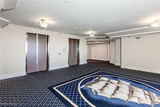 interior space with carpet and elevator