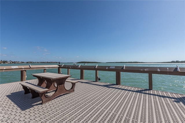 dock area with a water view