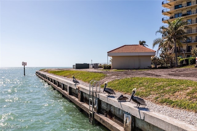 dock area featuring a water view