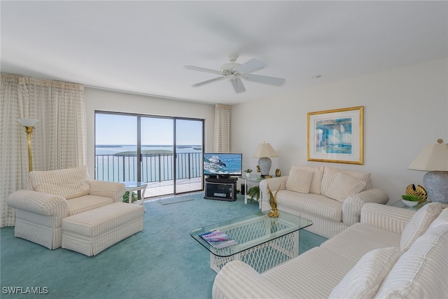 living room featuring ceiling fan and carpet flooring